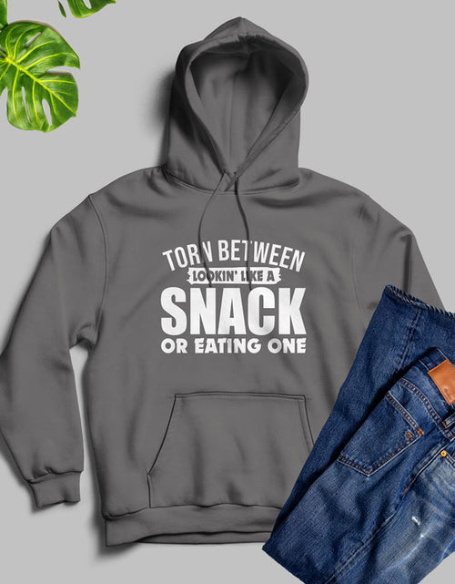 Load image into Gallery viewer, Torn Between Lookin Like A Snack Or Eating One Hoodie
