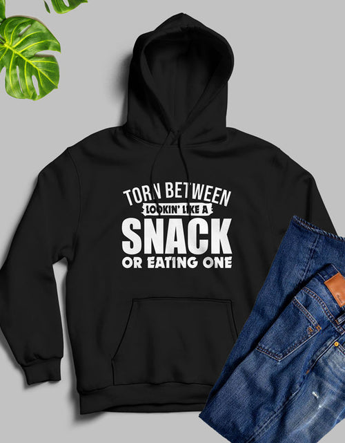 Load image into Gallery viewer, Torn Between Lookin Like A Snack Or Eating One Hoodie
